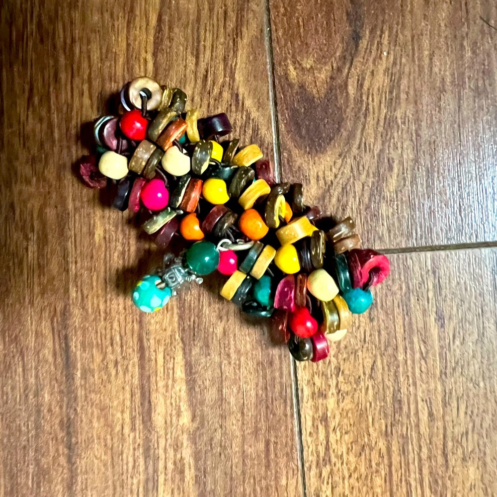 Beaded necklace with wood and turtle bead